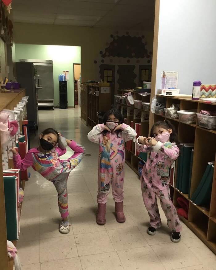 Children enjoying pajama day at Sunny West